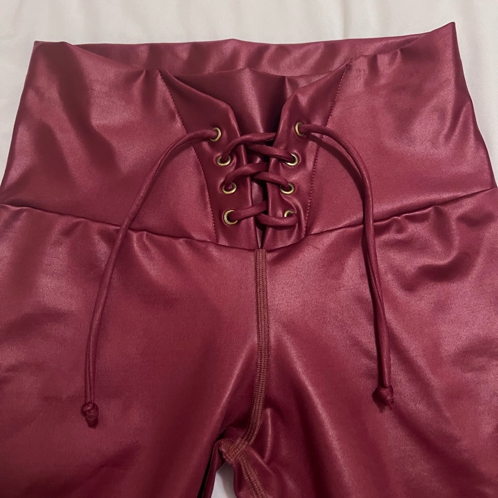 NWOT. Leg shaping and butt lift, small size, burgundy, wine red color.